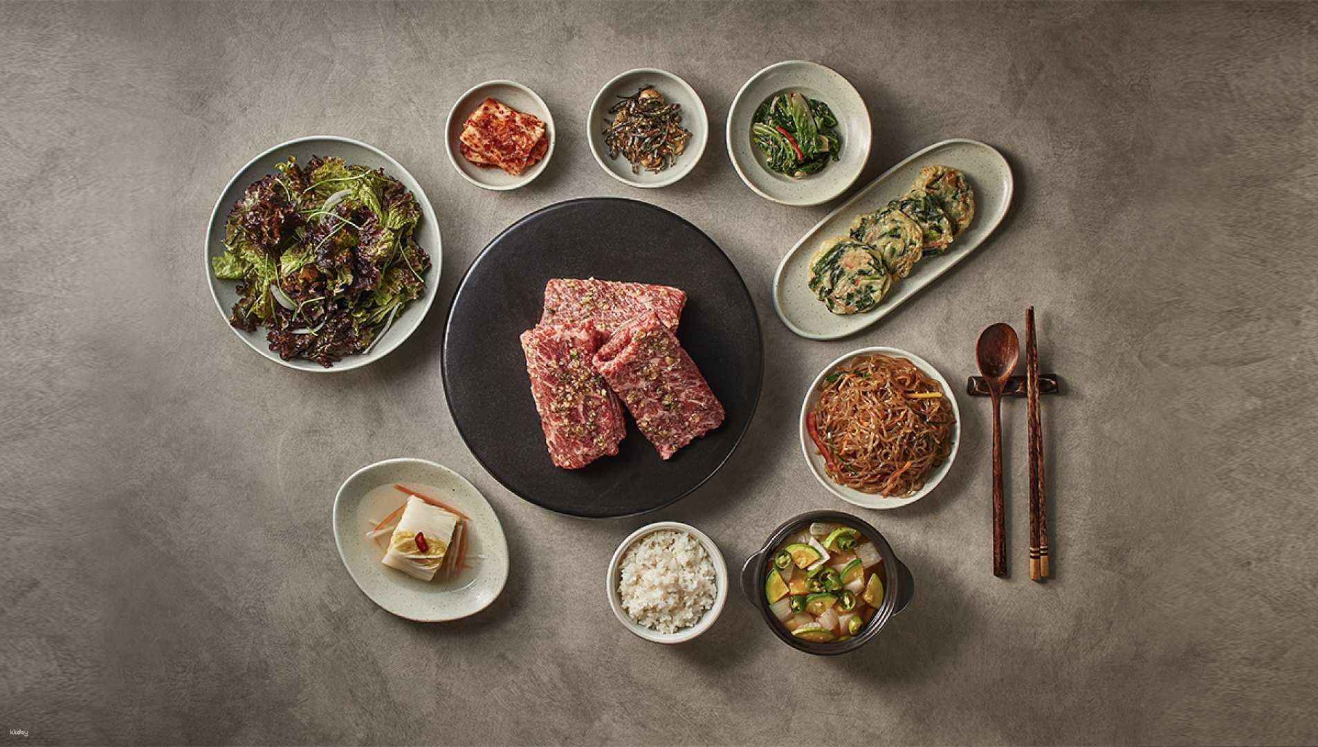 Savor the essence of Korea at Hwachoonok where tender Suwon Galbi meets an array of delightful side dishes all served with exceptional care and culinary tradition.